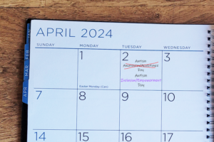 Image of a day planner with April 2 marked with Autism Awareness/Acceptance Day that has been crossed out with Autism Empowerment Day written below it